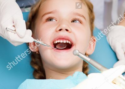 stock-photo-little-girl-sitting-in-the-dentists-office-112019783